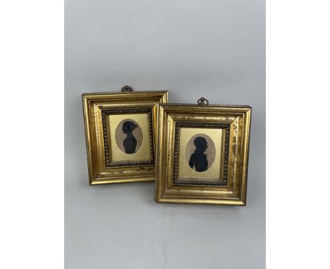 PAIR OF EARLY VICTORIAN PORTRAIT SILHOUETTES, in later frames, 19.5cm x 17.5cm overall