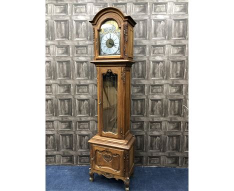 OAK GRANDFATHER CLOCK, the gilt dial with a silvered chapter ring, with three brass weights, 211cm high