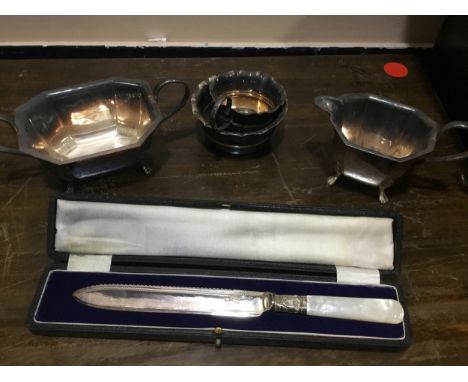 LOT OF SILVER PLATED WARE, including a pair of candlesticks, cased flatware and various tea ware including a tray