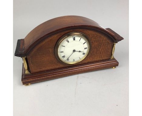 EDWARDIAN INLAID MAHOGANY MANTEL CLOCK, with white enamel dial, brass pilasters and feet, 28.5cm wide