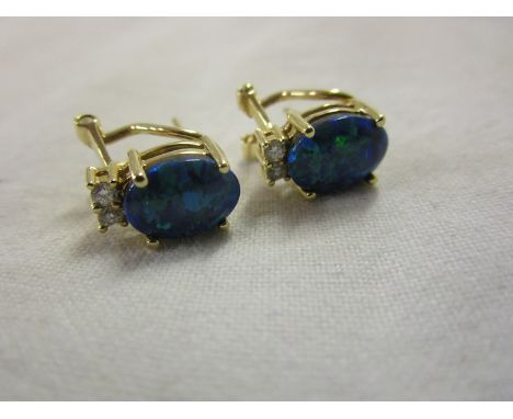 Pair of 14ct gold opal and diamond earrings