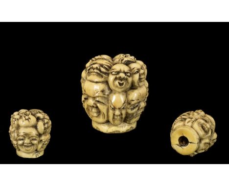 Japanese Meiji Period Carved Ivory Cane Walking Stick Knob carved with numerous comical faces, Measures 1.5 inches,