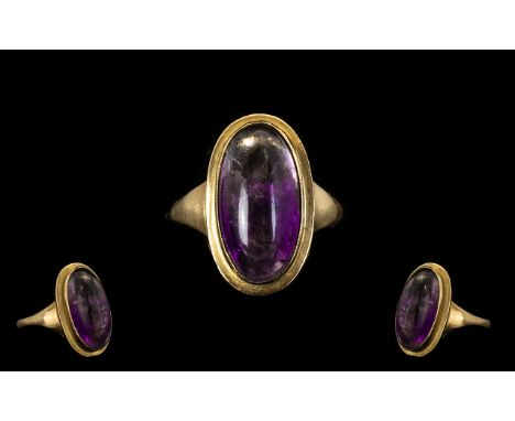 9ct Gold Dress Ring Set With A Cabochon Cut Amethyst, Fully Hallmarked, Ring Size O, Weight 4.2 grams. 