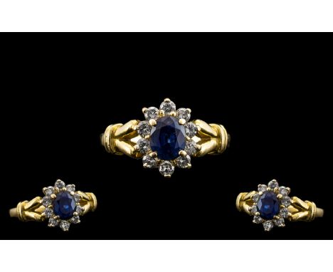 18ct Gold Attractive Sapphire and Diamond Set Cluster Ring - Flower head Setting. Mark 750 - 18ct. The Natural Sapphires and 