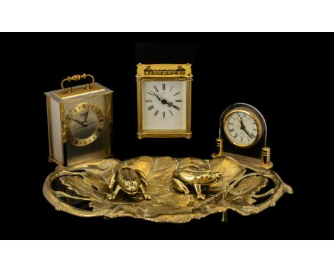 Box of Miscellaneous Brass Ware to include two carriage clocks,  two frog shaped ashtrays,  a small mantle clock and a large 
