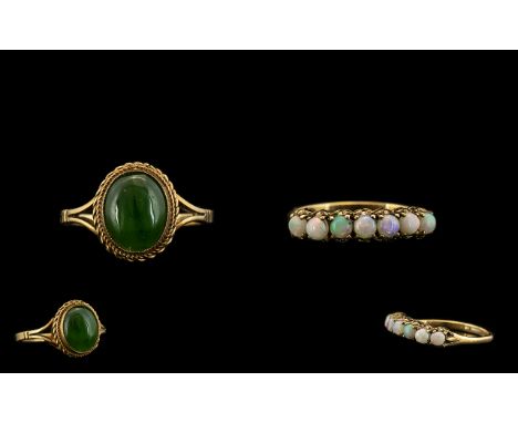 Two 9ct Gold Dress Rings One Set With A Row Of 7 Opals, Gallery Mount. Unmarked, Ring Size R. The Other Set With A Green Cabo