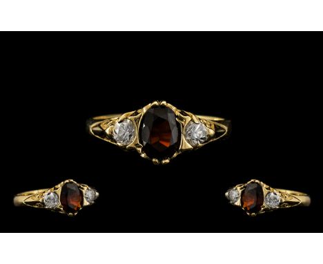 Antique Period 9ct Gold Attractive 3 Stone Diamond and Garnet Set Dress Ring with full hallmarks for 9ct. The central faceted