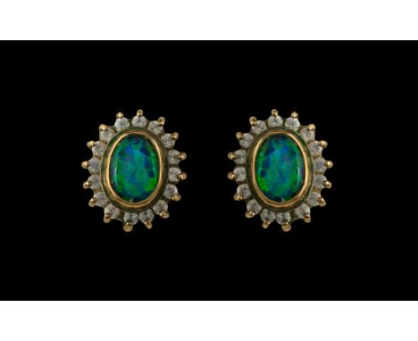 Pair of Opal Stud Earrings surrounded by CZ stones.  Original receipt from Baubles the Jewellers of Church Street, Blackpool,