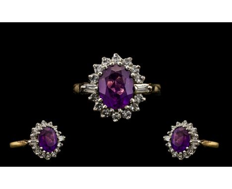 Ladies 18ct Gold Amethyst And Diamond Cluster Ring, Central Oval Amethyst Surrounded By 14 Round Brilliant Cut And 2 Baguette