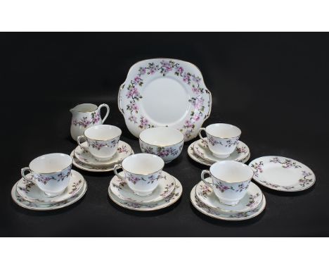 Staffordshire Bone China Crown Part Tea Set comprising milk jug, sugar bowl, five saucers, five cups, six small cake/sandwich