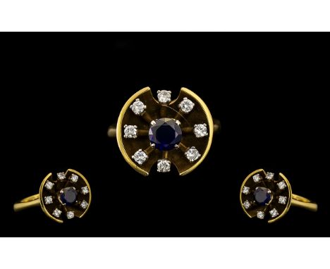 18ct Gold Attractive &amp; Well Designed Diamond &amp; Sapphire Set Dress Ring.  The central blue sapphire surrounded by eigh