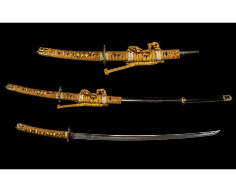 Japanese Replica Samurai Sword with Scabbard with a shapes Tsuba, with attachments 42" in length.  Please see images.