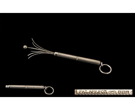 A Silver Cocktail/Swizzle Stick engine turned case hallmarked for Birmingham 1960. Length 3 inches.
