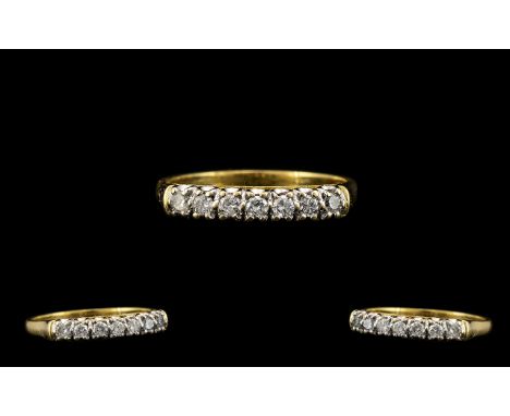 18ct Gold Nice Quality Seven Stone Diamond Ring - in a gallery setting. All seven brilliant cut diamonds of good colour and c