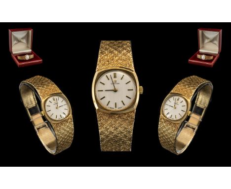 Ladies 9ct Gold Omega Wristwatch With Integral Textured Bracelet Strap, 18mm Silvered Dial, Baton Numerals, Marked Omega, Man