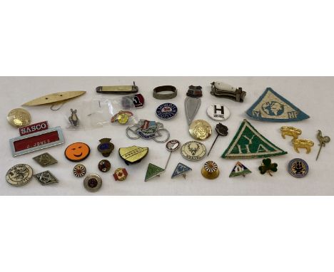 A collection of vintage pins badges, cloth badges and other small misc. items. Badges include Merchant Navy, The Independent 
