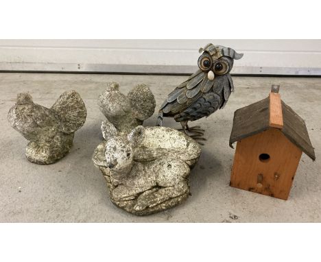 3 small concrete garden ornaments together with a wooden bird house box and a metal owl. Concrete ornaments comprise: 2 doves