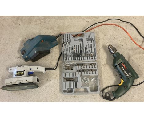 A Bosch electric hand drill CSB550RE 550w and Bosch drill bit set. Together with a Black and Decker planer (a/f) and an Einhe