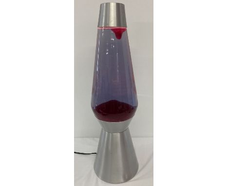 A very large lava lamp with brushed aluminium effect casing and red coloured wax.  Approx. 68cm tall.