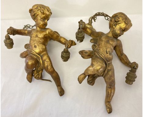 2 vintage gilt plaster ceiling hanging light fixtures, in the shape of cherubs.  Cherub approx. 34cm long.