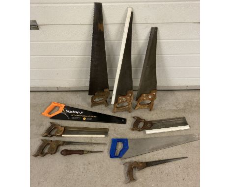 A collection of vintage and modern saws to include hands saws, keyhole saws and tenon saws.  