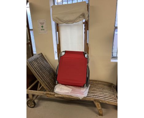 3 garden sun loungers. A vintage wooden slatted lounger with rear wheels, a modern wood and cream canvas lounger with hood an