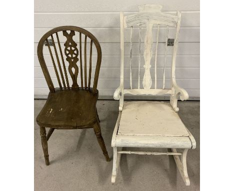 A vintage painted white wooden rocking chair with replacement seat, suitable project. Together with a wheelback kitchen chair