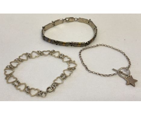 3 modern and vintage silver bracelets. A 7 panel duo coloured silver bracelet with lobster style clasp, a heart link bracelet