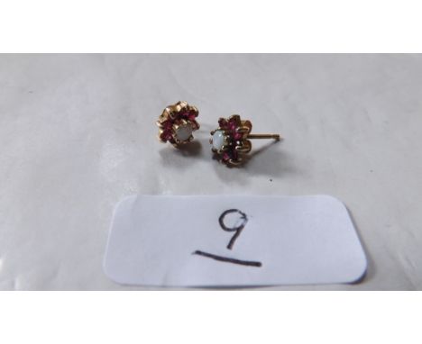 Pair gold mounted opal & ruby ear studs    