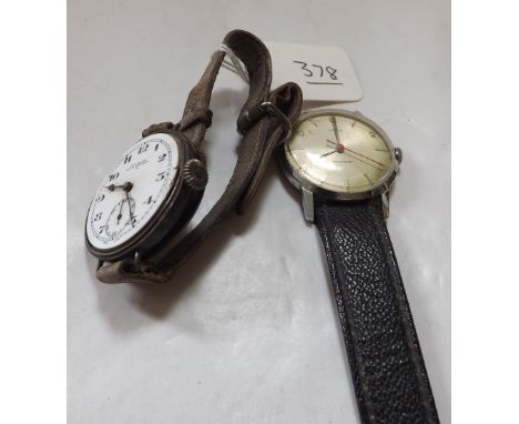 A Timex shockproof gents wristwatch and a silver  cased watch from John Walker London a/f    