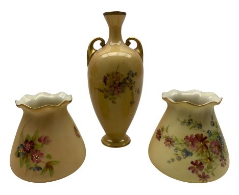 Pair of Royal Worcester blush ivory porcelain posy vases, with floral decoration shape no. 957, H9cm; Royal Worcester blush i