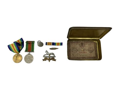 WWI Princess Mary gift tin containing WWI pair of War and Victory medals to 29313 Pte. R Burnell, West Yorkshire Regt., WWII 