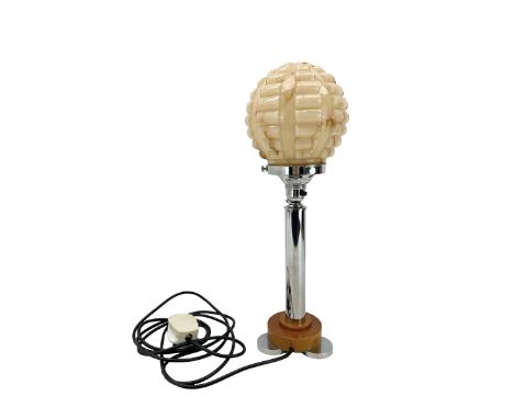 Art Deco chrome and bakelite table lamp, with cylindrical stem, circular stepped base and marble effect moulded glass shade, 