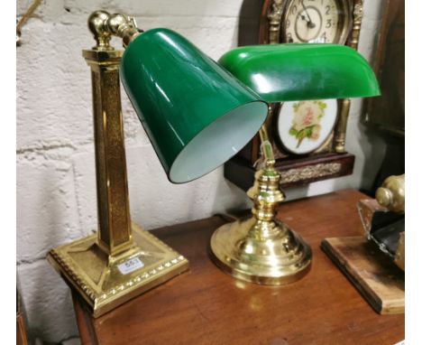 A brass single column desk lamp with green glass shade, pivoting head, 40cm h &amp; a similar brass desk lamp with green glas