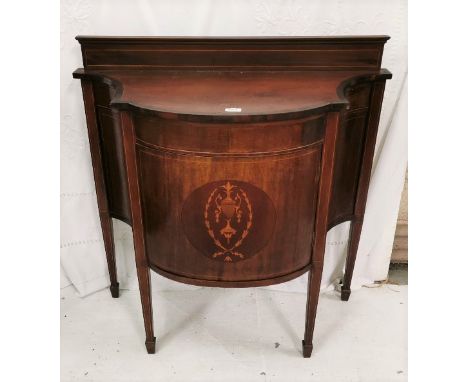 Edwardian Mahogany Side Cabinet, with a serpentine and bowfront shaped front inlaid panel, enclosing a shelf, on tapered legs