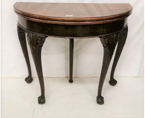 Demi-Lune Shaped Foldover Mahogany Card Table, on acanthus designed legs, with ball and claw feet, purple baize inside, pull 