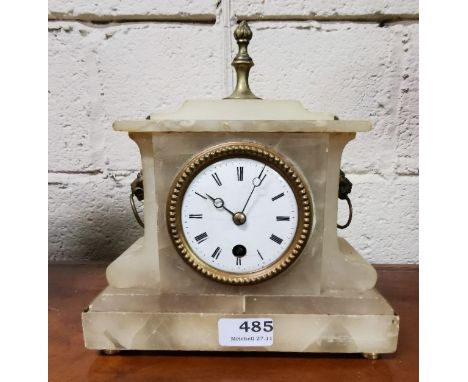 Alabaster Mantel Clock, the works stamped "Paris" with lion head finials, 24cm x 24cm
