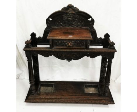 19thC Oak Stick Stand, carved with applied foliage carvings, apron drawer and 2 drip trays, 42”w x 47”h