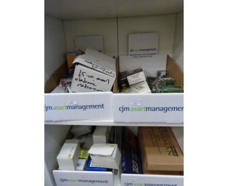 * Two shelves of assorted Musical Items including clarinet accessories, tuners, Kinsman stands, adaptors etc.