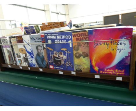 Two bookshelves of Music Literature to include ''The Who The Definitive Collection (Recorded Guitar Version)'', Coldplay Ghos