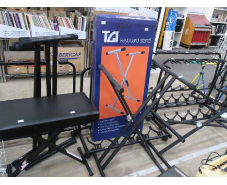 * A lot to include a Leather Seated Dixon Keyboard Bench, three X-Frame Keyboard Stands and one 2 Tier X-Frame Keyboard Stand