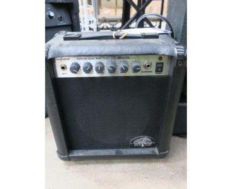 * A Tanglewood Performer series model CG-10 Amplifier. Max power 25 Watts Serial number TA951132 (est £60-£120) 