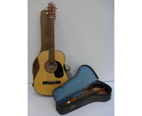 * A K Kay Gioi Six String Guitar in Faux Leather Carry Case, also includes a Dulcetta Ukulele in need of renovation, with an 