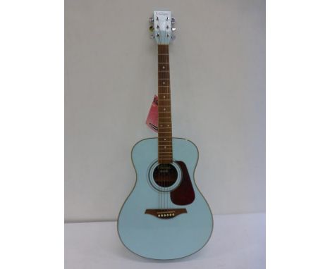 * A Blue Vintage Guitar with soft carry case Model V300BL (RRP £169)