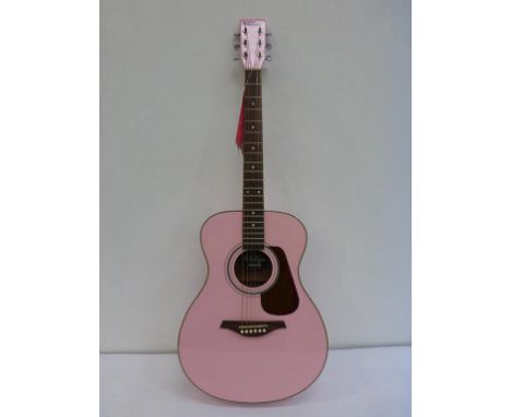 * A Pink Vintage Guitar with soft carry case Model V300PK (RRP £169)