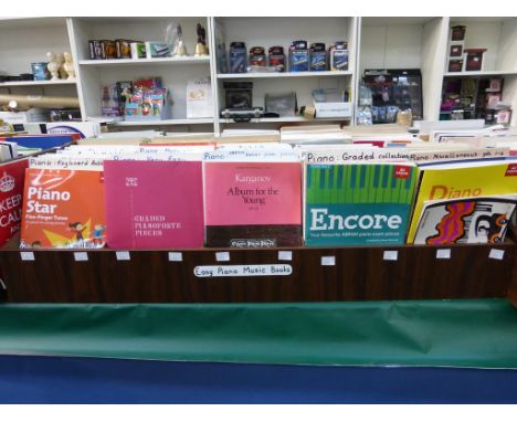 Five divided shelves of piano themed musical literature to include ''Karganov - Album for the Young'', ''Graded Pianoforte Pi