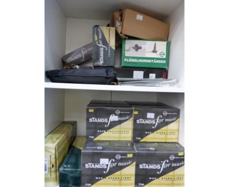* Two shelves containing K &amp; M Music Stands etc. (RRP £300+)