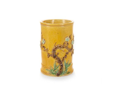 CHINESE SANCAI BRUSH POT, EARLY 20TH CENTURY  of cylindrical form, decorated with blossoming branches in relief  10.3cm high 