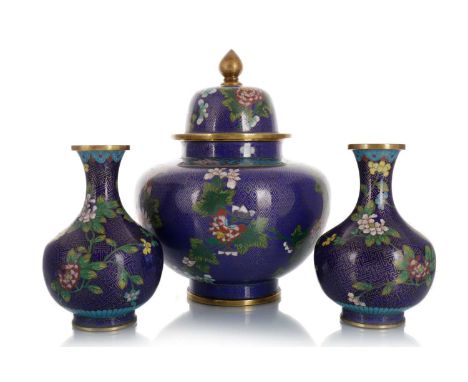 GROUP OF THREE CHINESE CLOISONNE VASES, EARLY 20TH CENTURY  each decorated with flowers and foliage, one vase lidded, each un