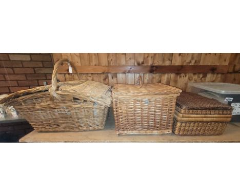 Three wicker picnic baskets, of varying shapes and sizes, containing related wares, including, loose cutlery and plateware.